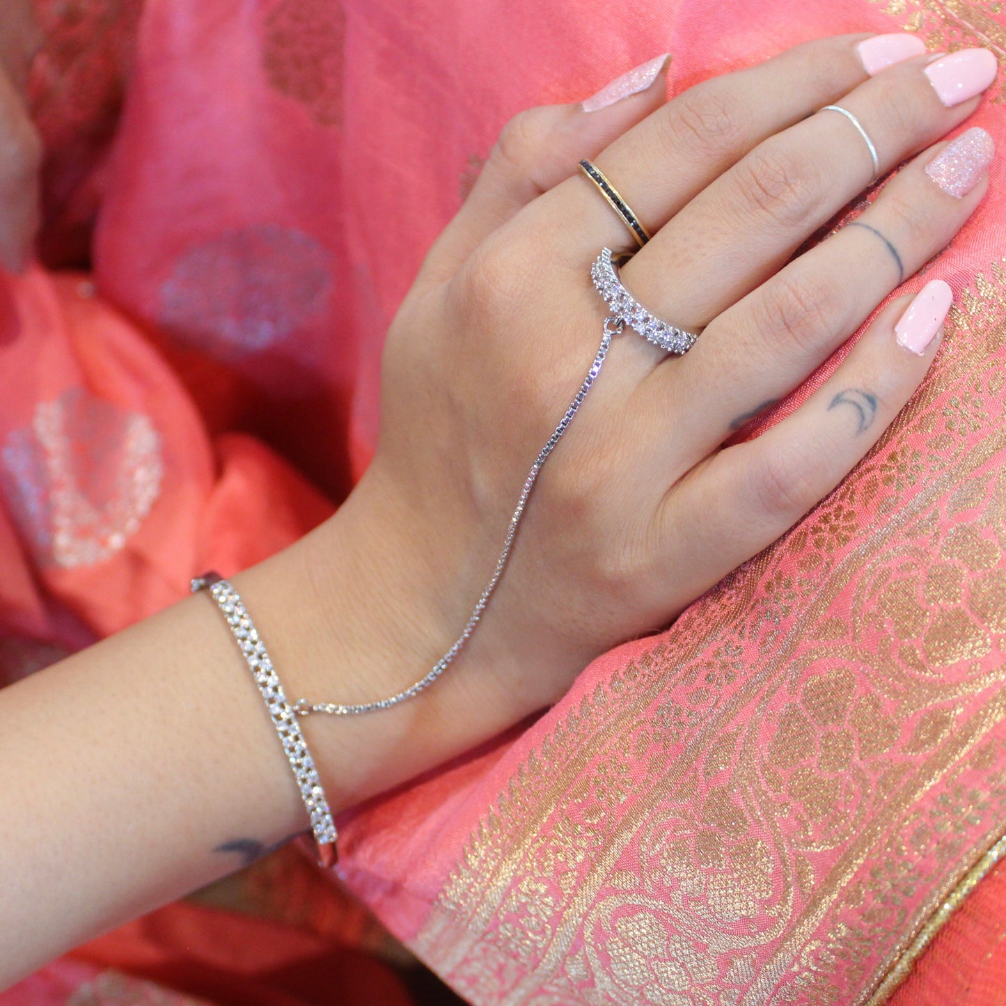 Elegant Silver Bracelet With An Attached Ring