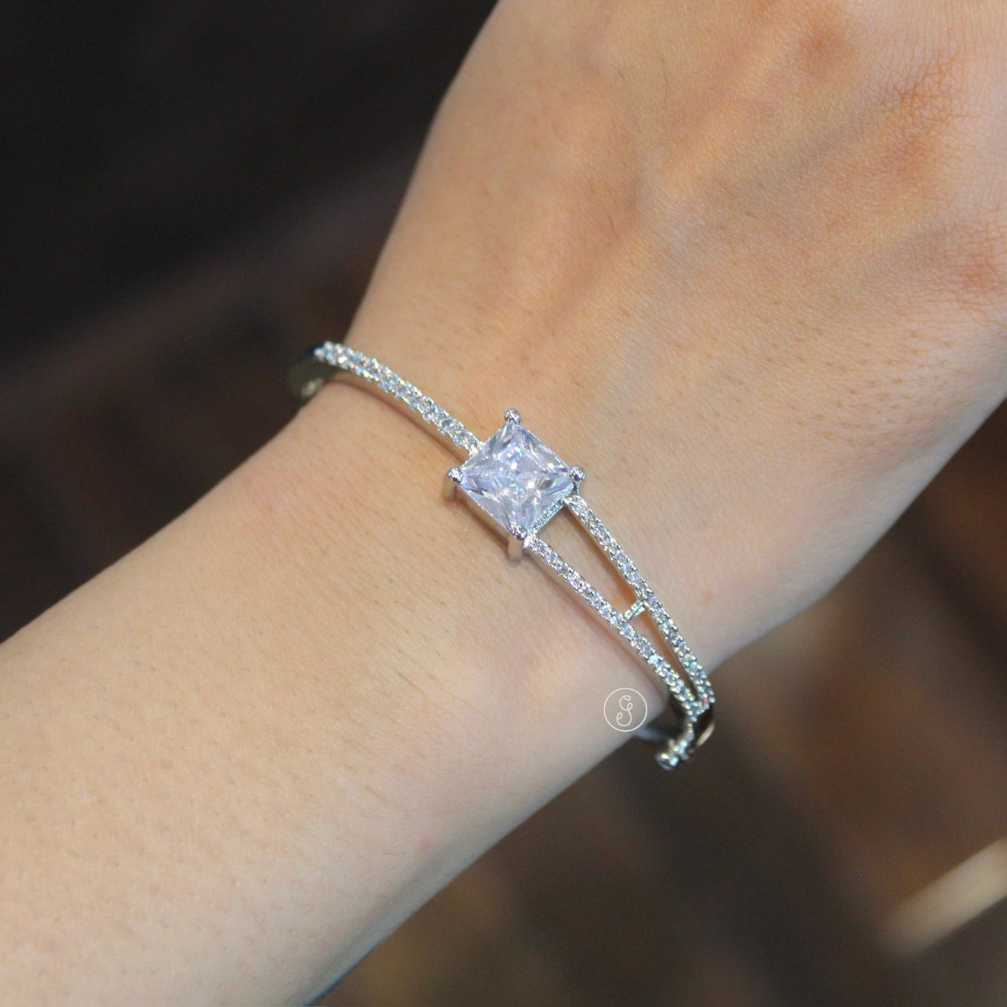 Elegant CZ Diamonds Silver toned Bracelet