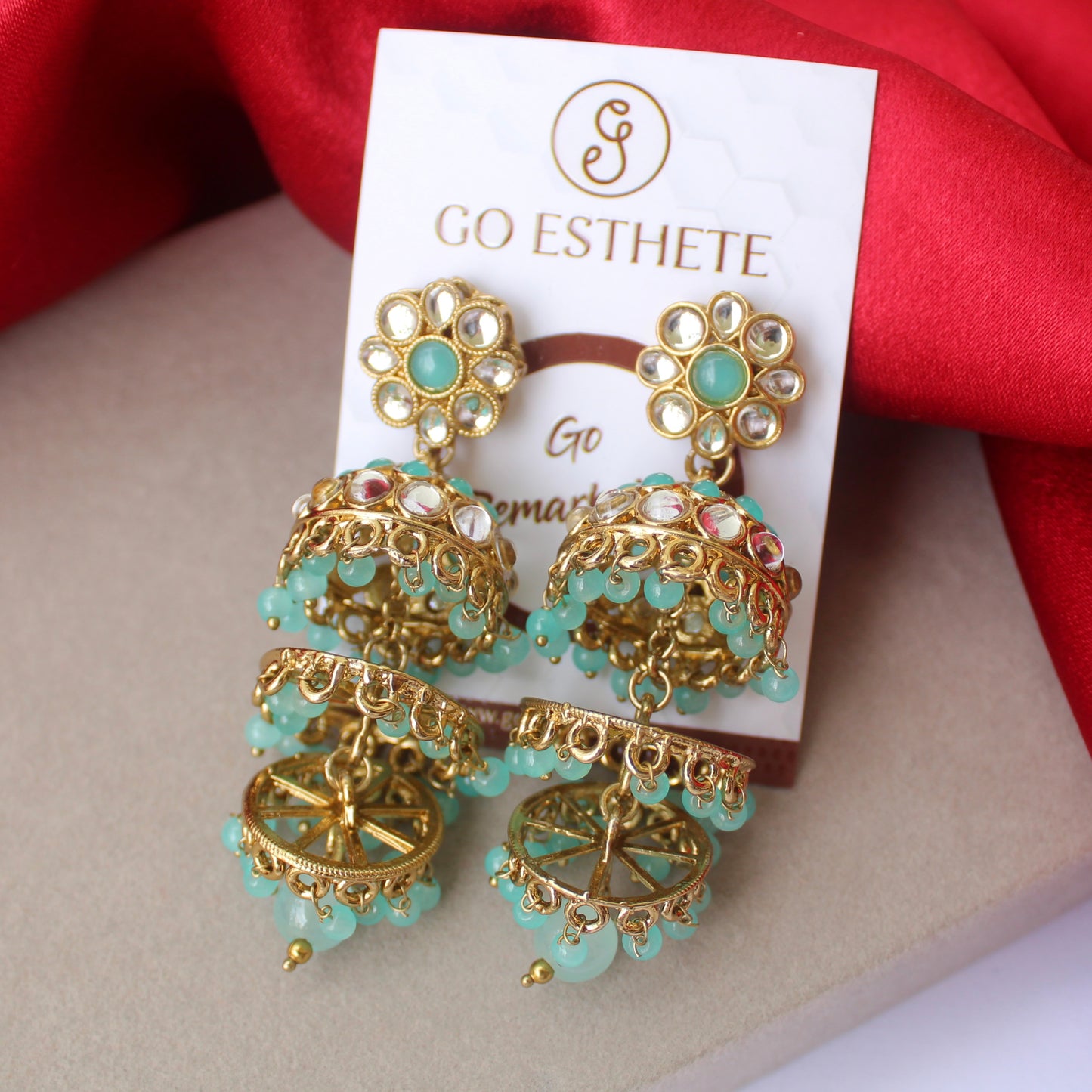Pretty Aqua Blue Multi-layered Jhumki Earrings