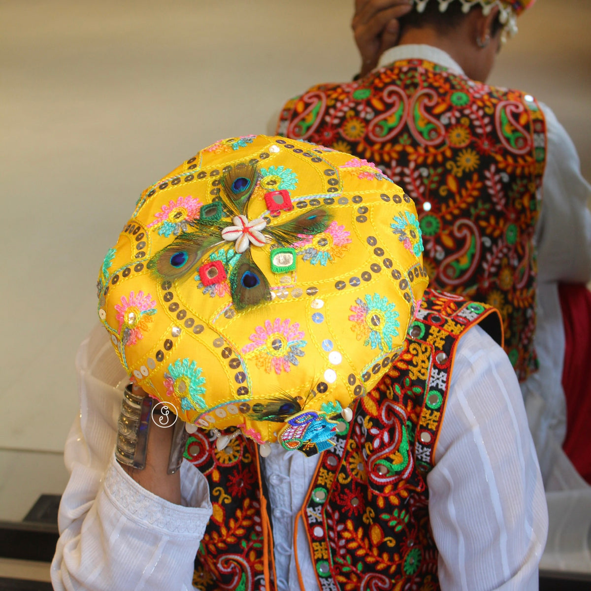 Yellow Multicolour Pagdi with Shells, Feathers & Krishna Motif