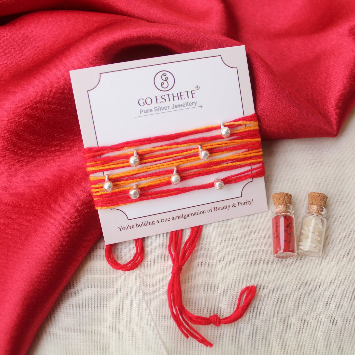 Pure Silver Ghungroo Rakhi with Sacred Moli Thread