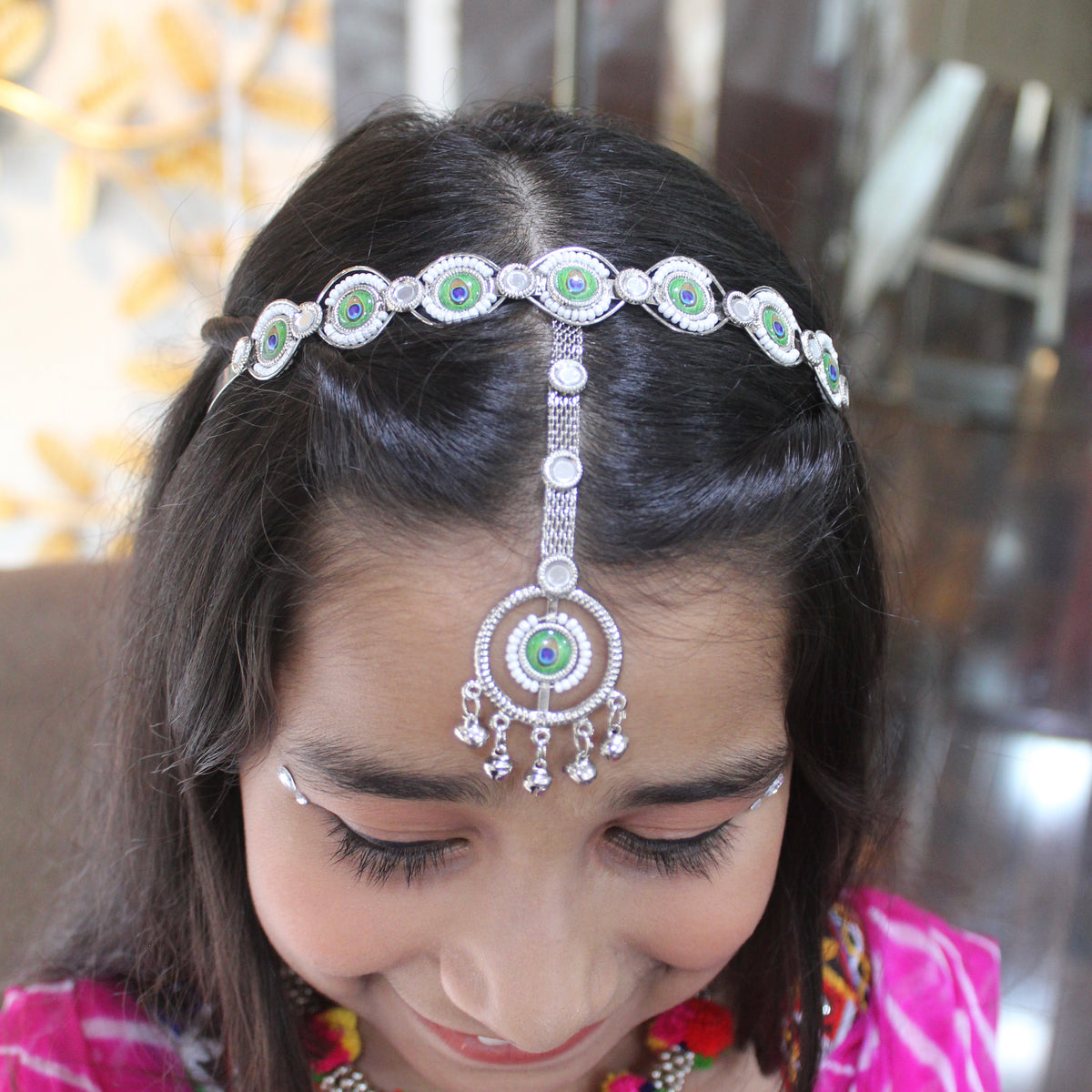 Silver Toned Hairband With Attached Tika