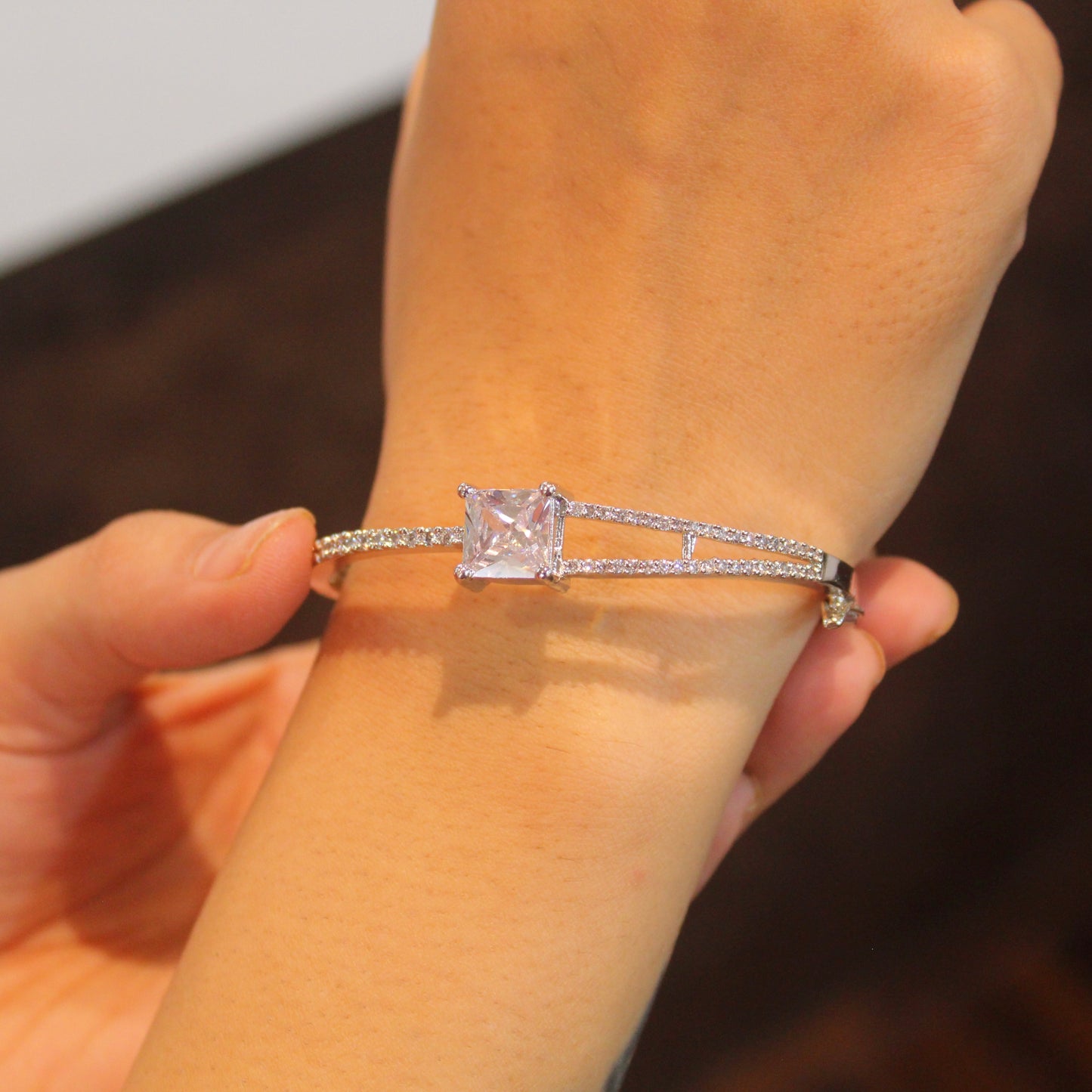 Elegant CZ Diamonds Silver toned Bracelet
