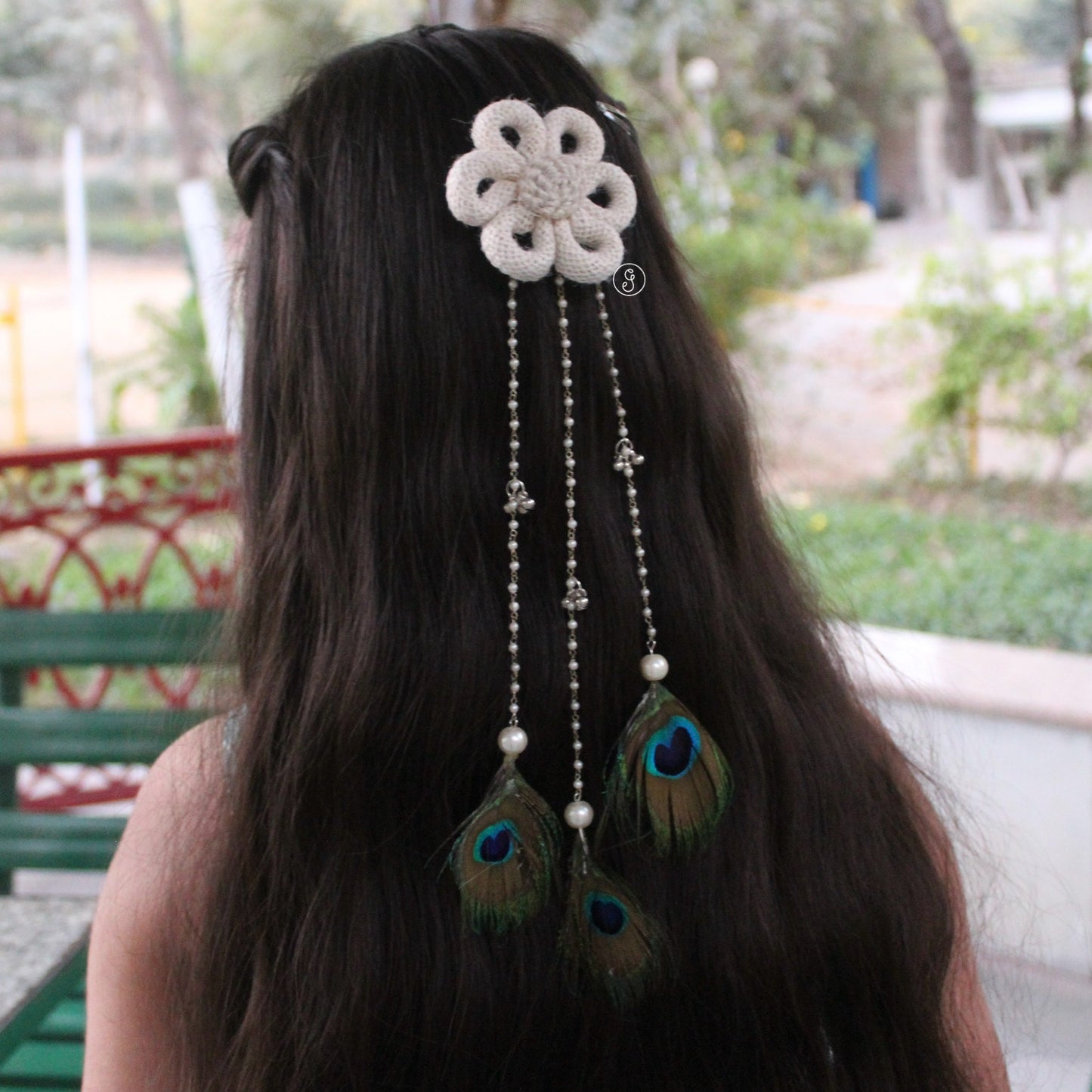 White Jute Flower Hair Clip with Peacock Feather Hangings