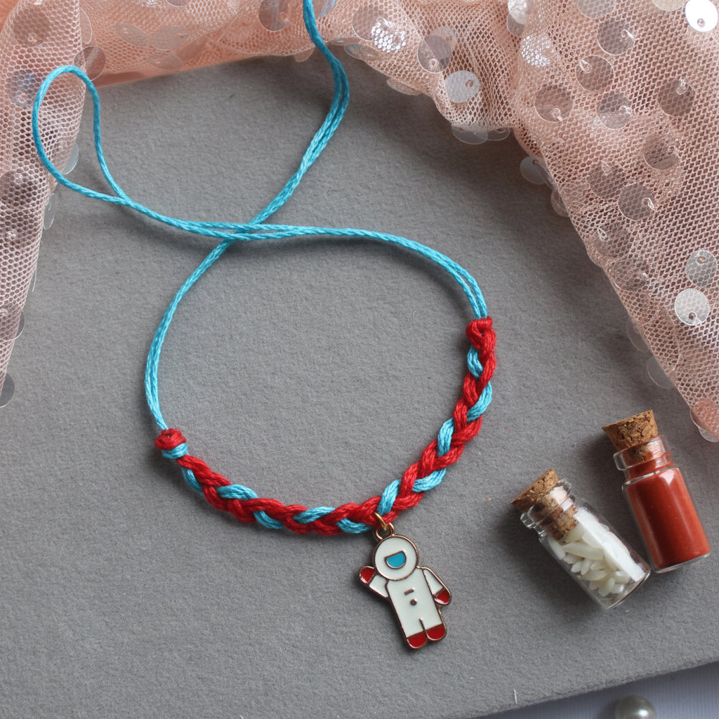 Cute & Colourful Kids Rakhi With Astronaut Charm