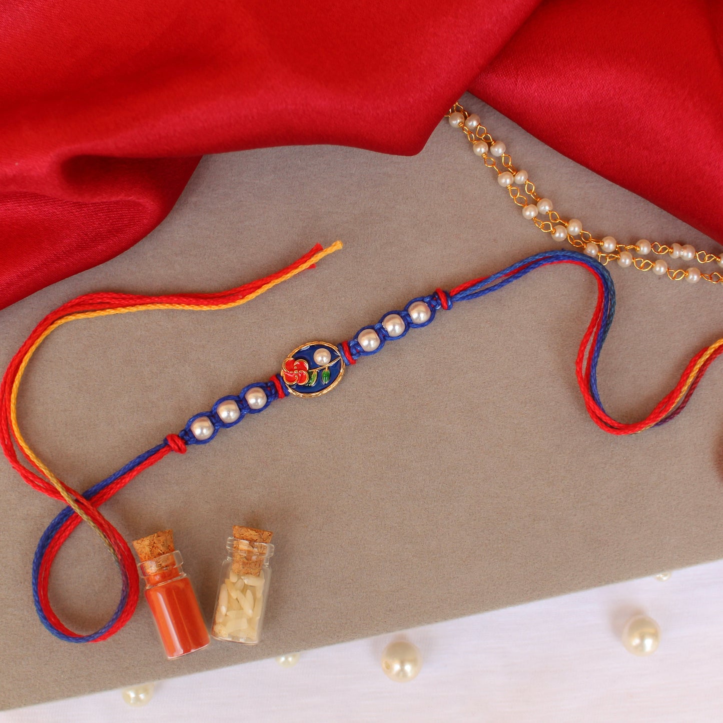 Blue Floral Rakhi & Bracelet Pair