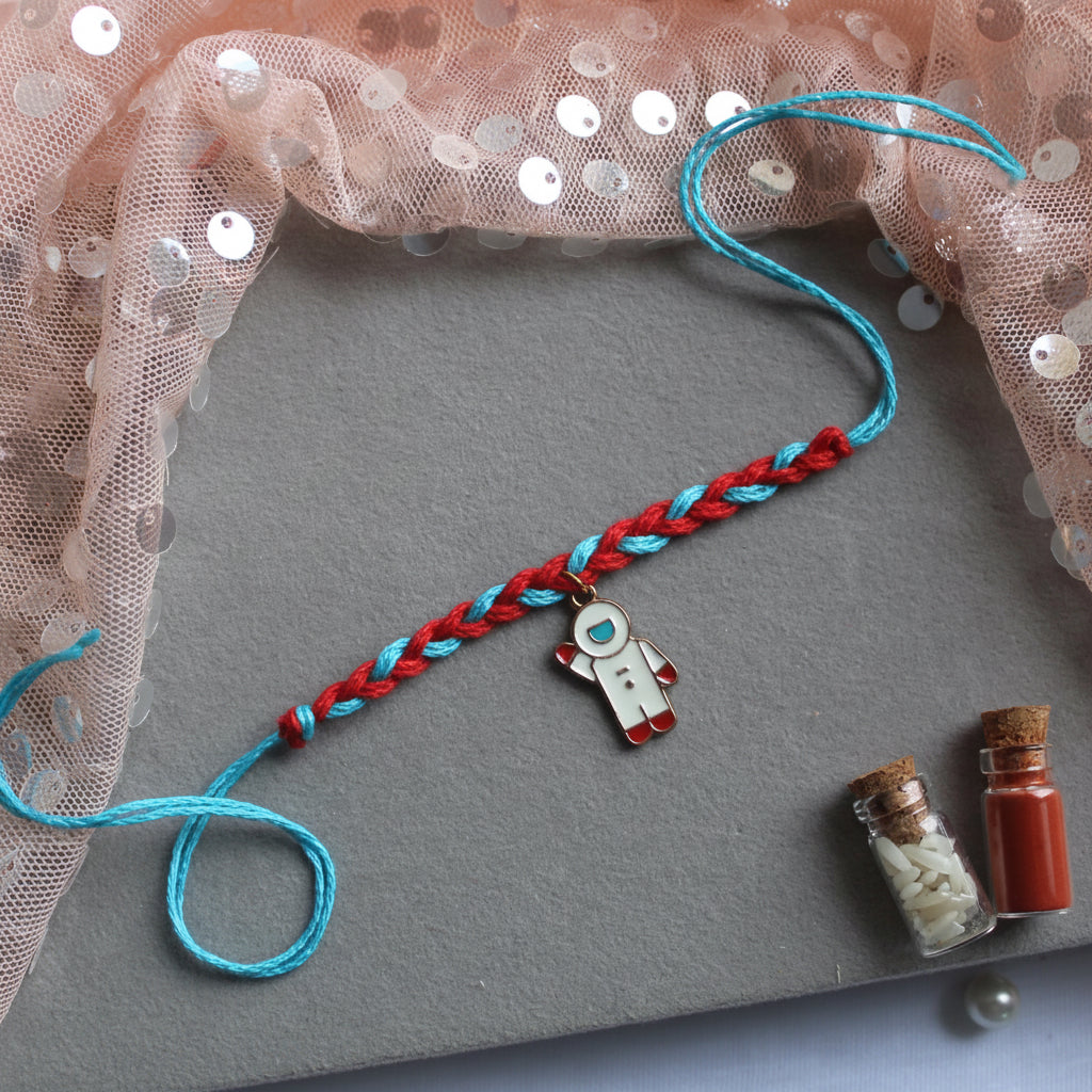Cute & Colourful Kids Rakhi With Astronaut Charm