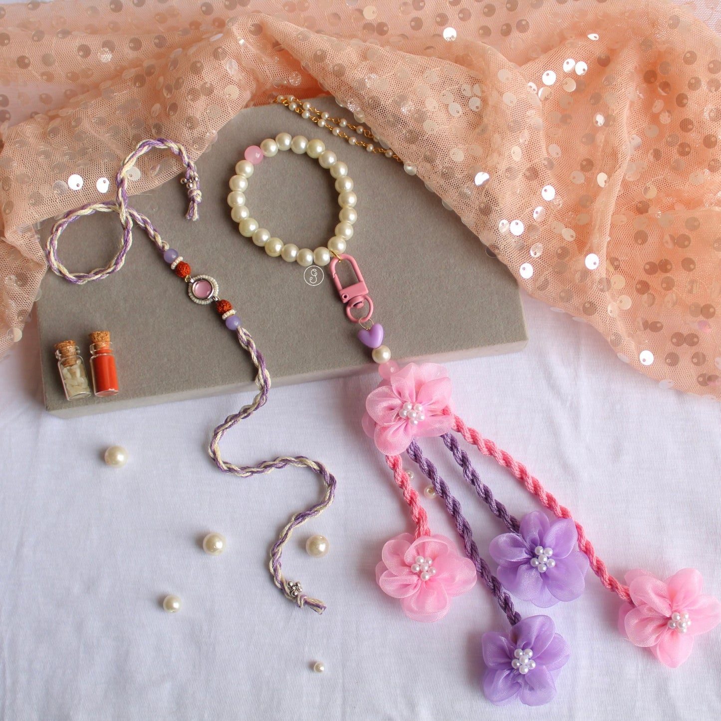 Pastel Floral Bhai & Bhabhi Rakhi Set