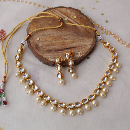 Timeless Kundan Necklace Set With Pearls Work