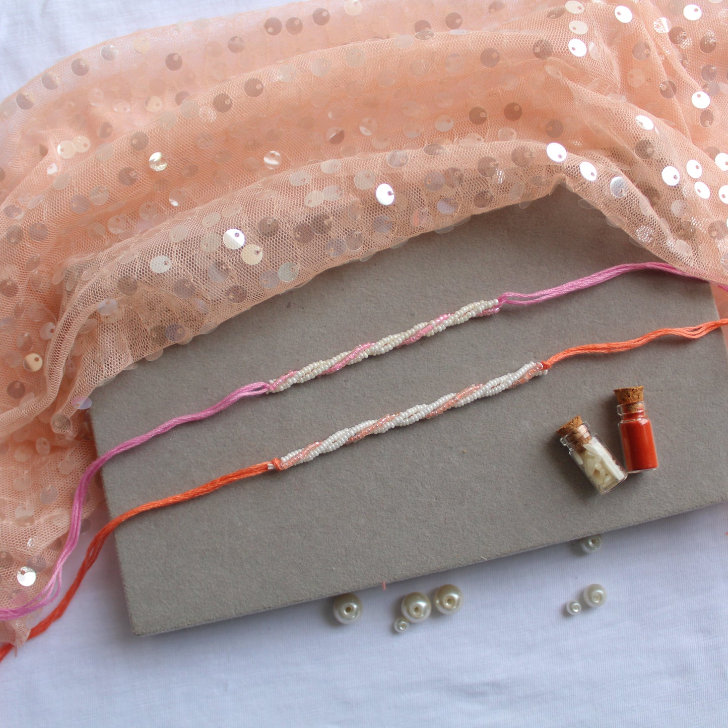 Set of 2 Elegant Rakhis (Peach & Lavender)