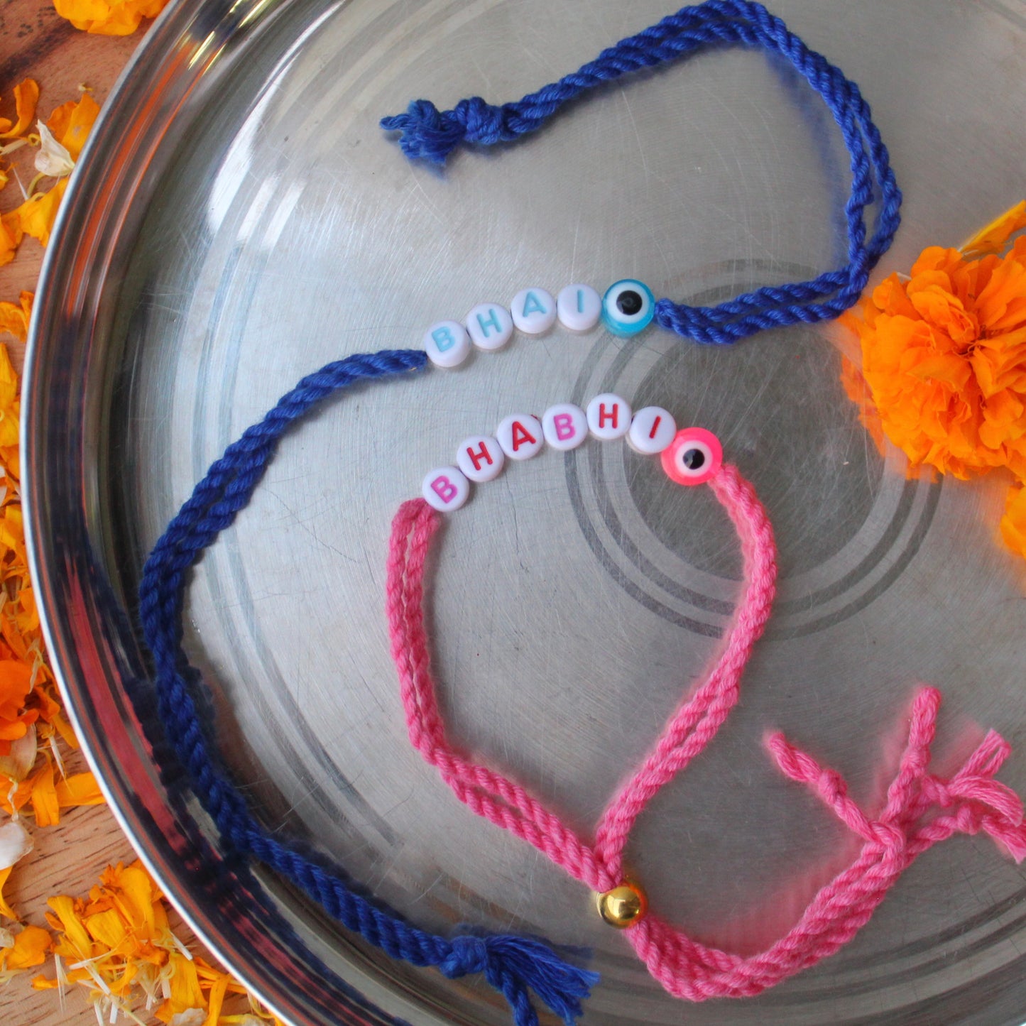 Blue & Pink Bhai-Bhabhi Alphabets Rakhi