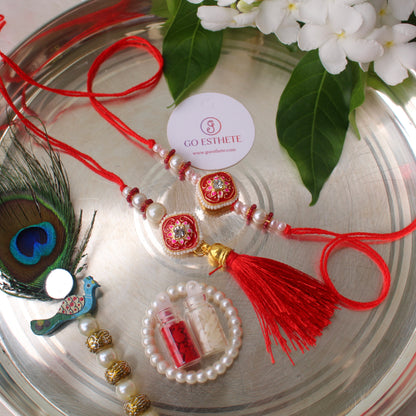 Pretty Red Rakhi For Bhai-Bhabhi