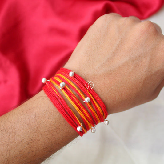 Pure Silver Ghungroo Rakhi with Sacred Moli Thread