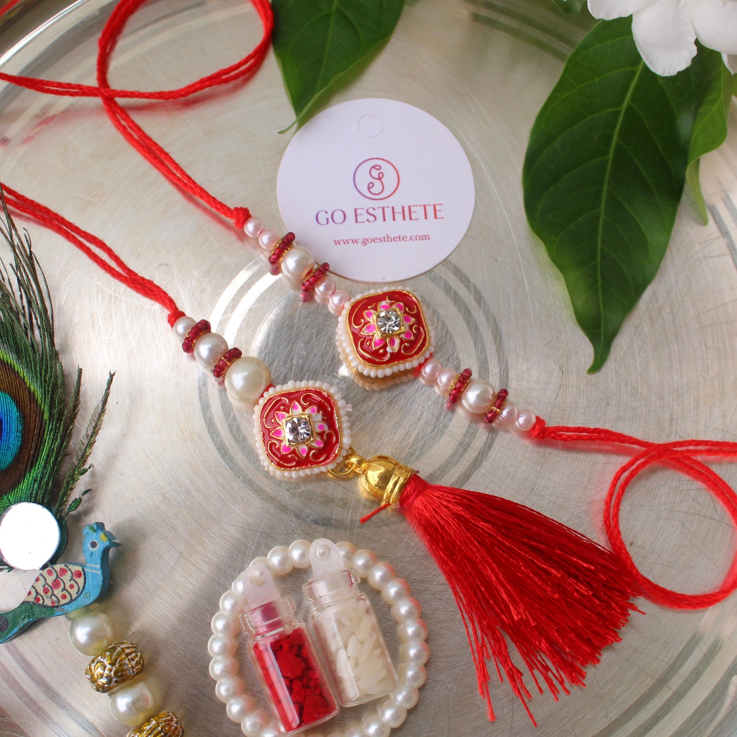 Pretty Red Rakhi For Bhai-Bhabhi