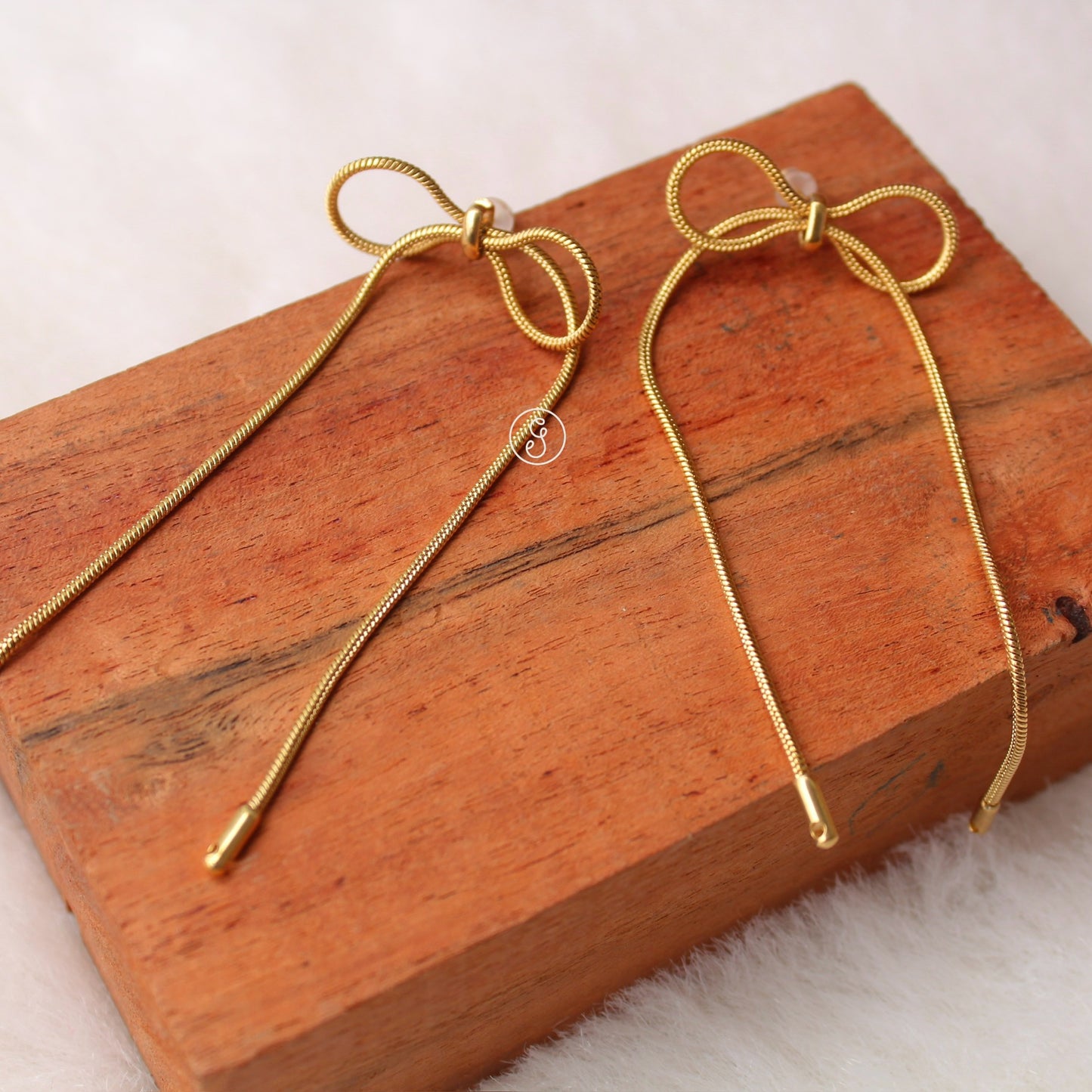 Long Yet Light-Weight Bow Design  Earrings